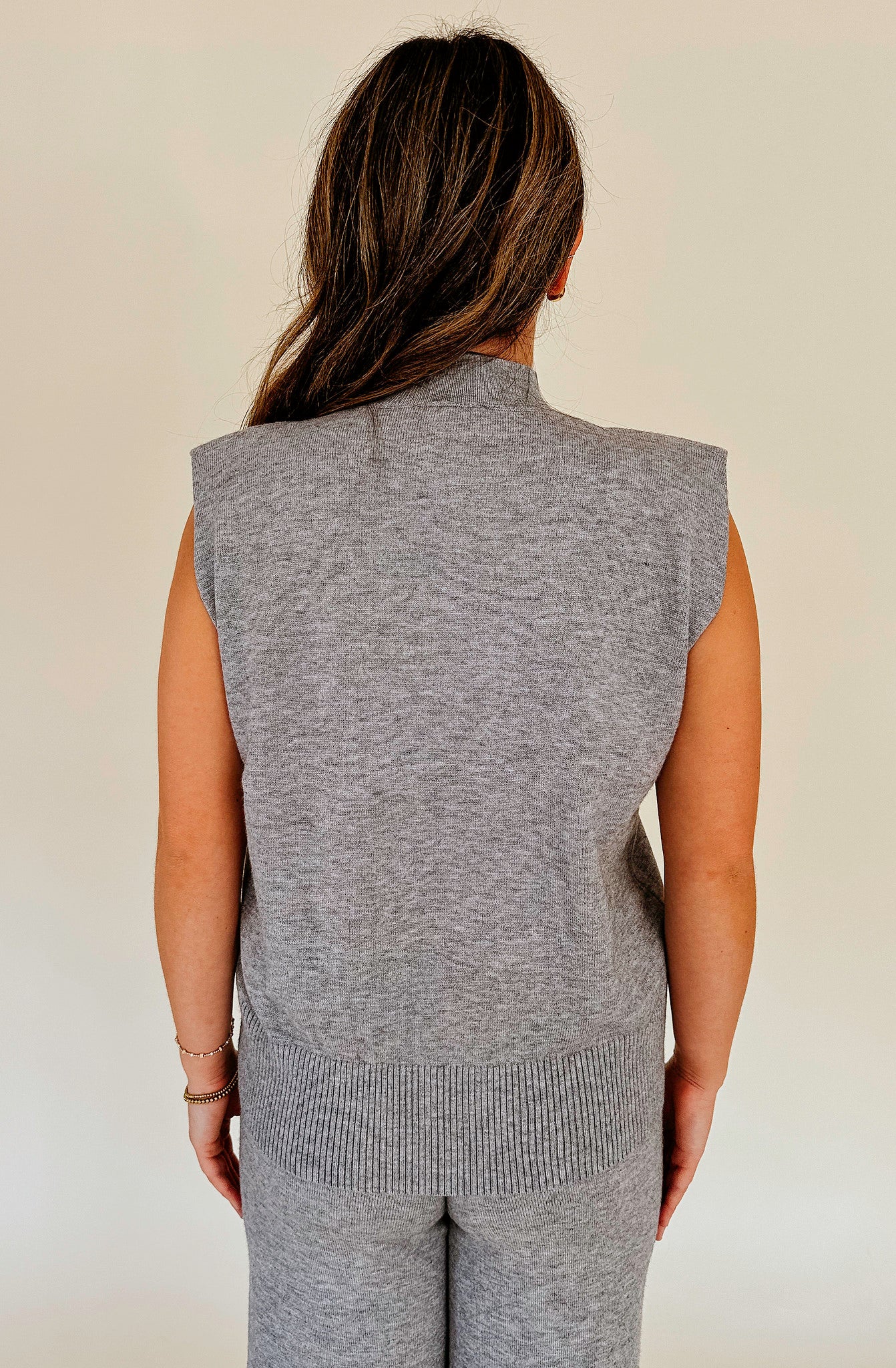 THE RILEY SLEEVELESS SWEATER TOP