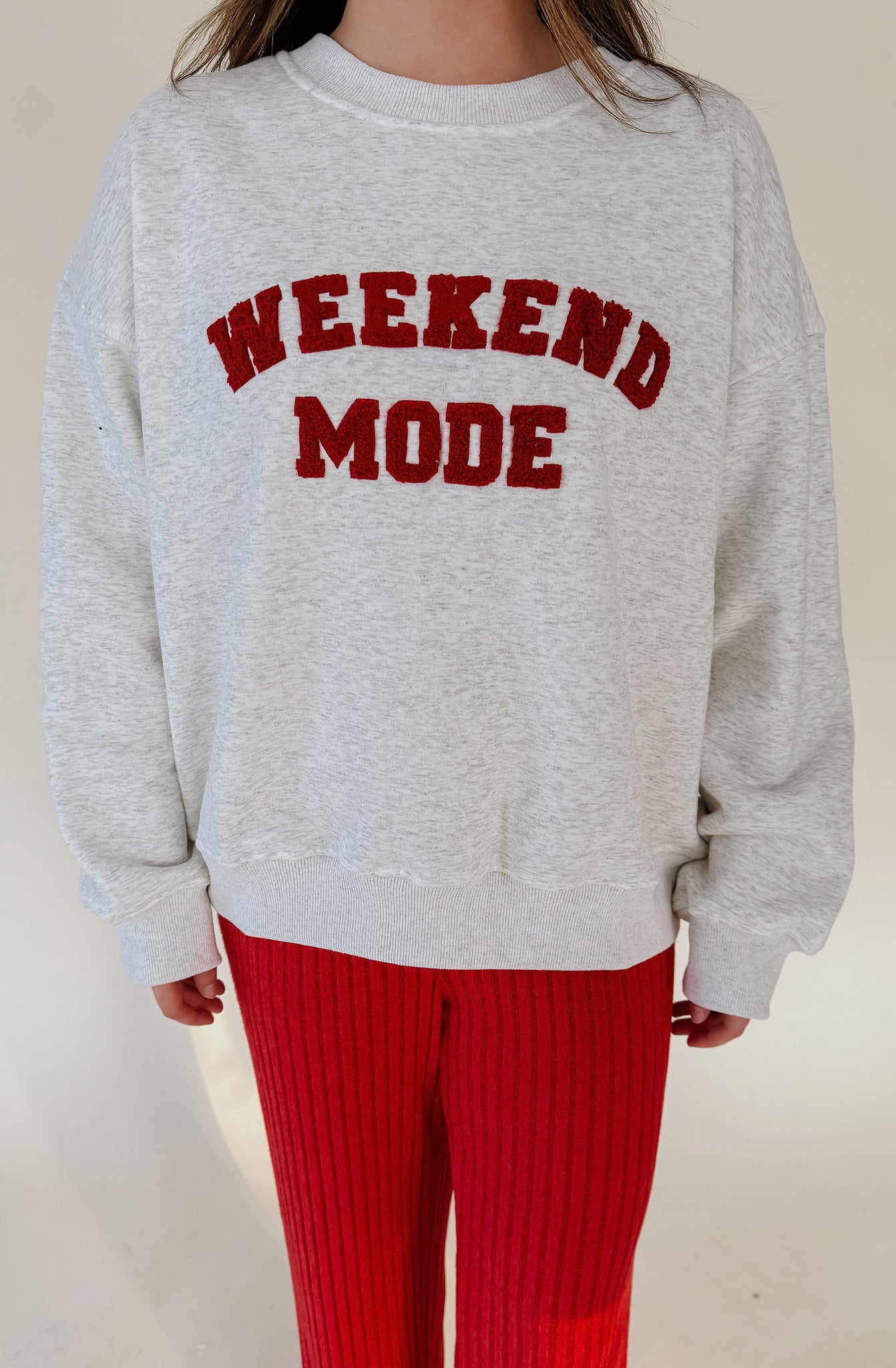 WEEKEND MODE RAISED LETTERING SWEATSHIRT